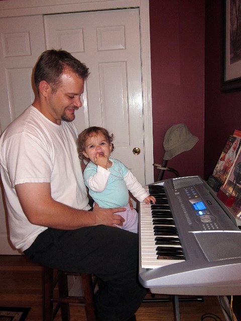 IMG_0487b.jpg - Catherine is spending some musical time with Daddy.