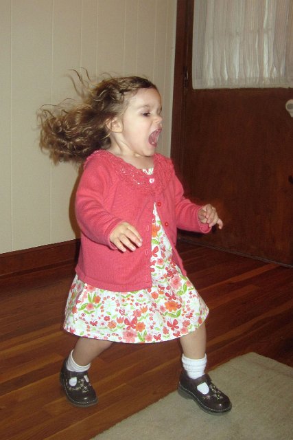 IMG_3842b.jpg - She was caught in action ... singing and running around the room.