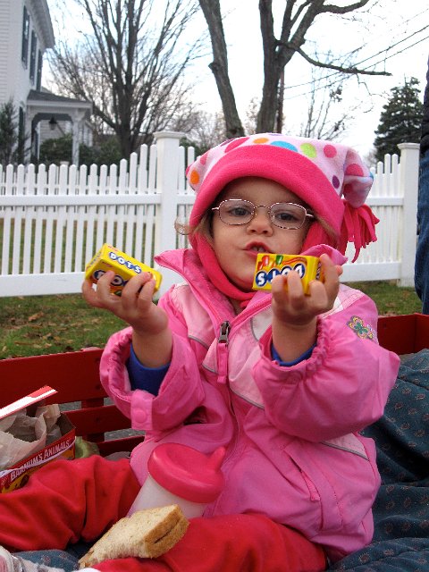 IMG_7357.jpg - Catherine showing off her loot.  (The parade participants hand out/throw candy during their route.)