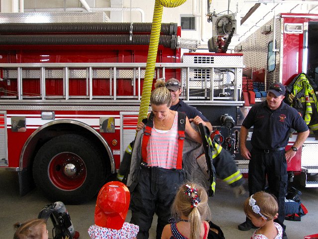 IMG_1017.jpg - One of the Mommies got to try on the entire uniform.