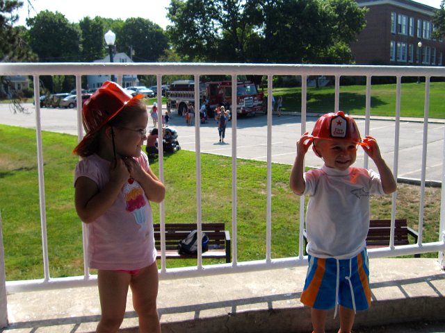 IMG_1167.jpg - It was Fire Engine Day in Andover.  The firefighters were NOT providing any relief from the heat wave with their hoses (as advertised), but the kids had a pretty good time anyway.