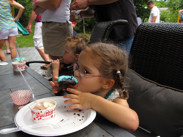 IMG_0669.jpg - Catherine was scrambling to find a seat so she could get in line for the cupcakes.