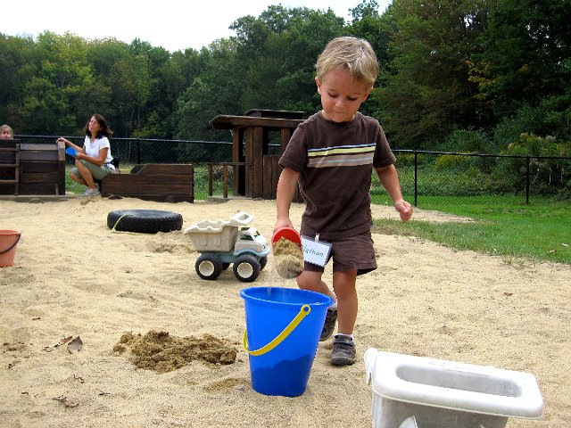 IMG_8099.jpg - He heads right for the sandbox to do some shovelling.