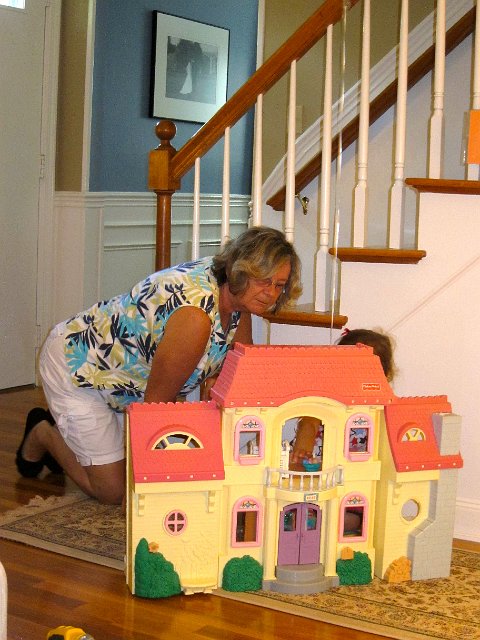 IMG_7394.jpg - She's showing off all the pieces and details of the inside to Nana.