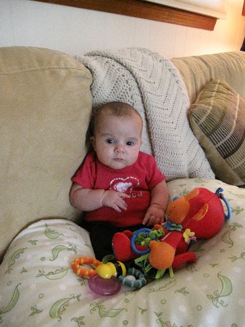 IMG_3284.JPG - Just a little girl sitting big and tall on a grown-up sofa ...