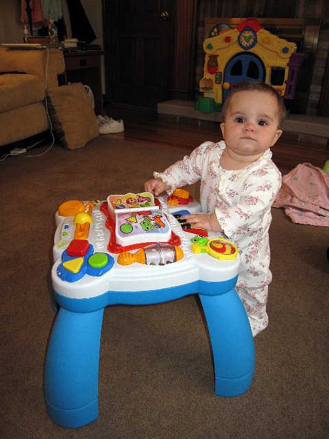 IMG_7890b.jpg - She pulled herself from a sitting position to standing for the first time!!!