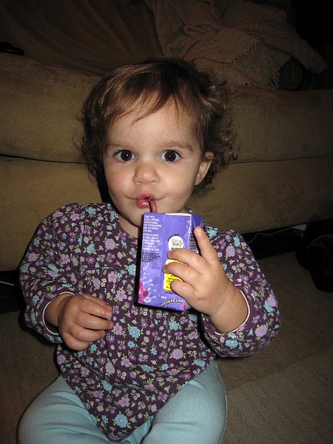 IMG_0649b.jpg - I guess at this age, a gal's best friends are her toys and her juice box!