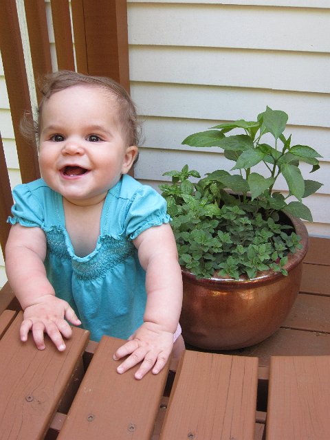 IMG_8344.JPG - Catherine is helping Mommy check on her herb garden.