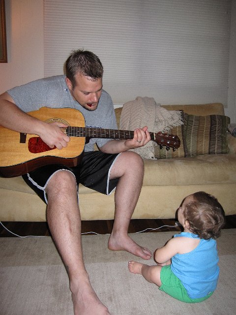 IMG_8516.JPG - On a slightly fussy day, music soothes our little teething gal.