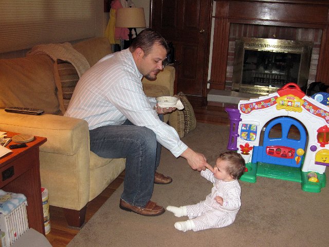 IMG_8197b.jpg - She has decided she likes Dad's oatmeal and begged him to share.