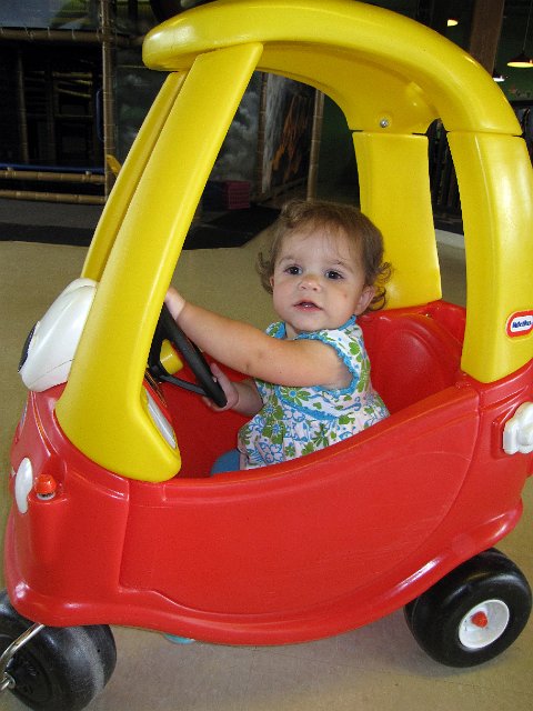 IMG_0211b.jpg - She took her first spin (push) around in a car at Imajine That.