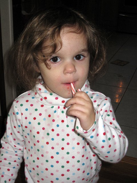IMG_2137b.jpg - Catherine and her first candy cane ... once it broke, she simply wanted another one!