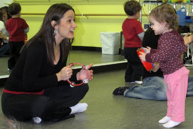 IMG_0748b.jpg - She's back in class again with some especially fun instruments and the instructor, Kelly.
