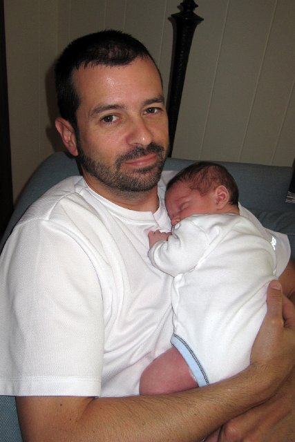 IMG_1004b.jpg - And so the family tour begins ... Uncle Tom holding his favorite nephew.