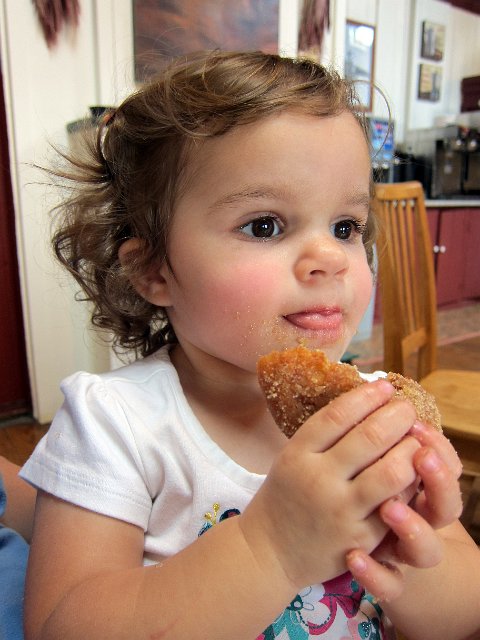 IMG_1869b.jpg - Catherine, of course, is an ole pro with the donut!