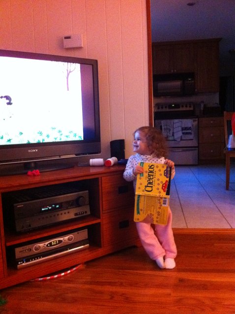 IMG_0290.JPG - Catherine's first introduction to Charlie Brown with "It's the Great Pumpkin, Charlie Brown".