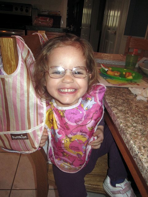 IMG_3549b.jpg - Catherine has hit a milestone ... no more booster seat at the kitchen table.  What a big girl!