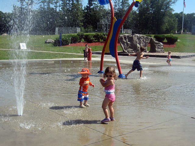 IMG_5935b.jpg - School is back in session for the big kids, a great summer day comes along and that means we head to a favorite park to take advantage of it.  The kids were surprised here when a sprinkler behind them turned on!