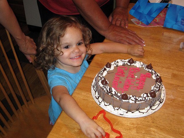 IMG_5020b.jpg - A new location = a new opportunity to celebrate Catherine's birthday.  This time with chocolate ice cream cake, thanks Grandpa!