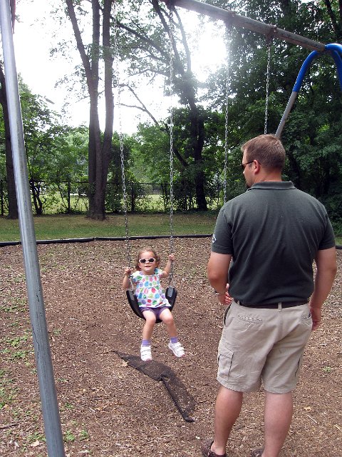 IMG_5066b.jpg - This swingset holds sweet memories for me as I recall MaryAnn swinging away like a young kid.  It's refreshing to see Catherine and Michael there enjoying themselves now.