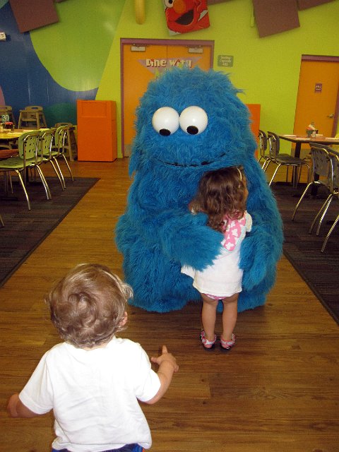 IMG_5244b.jpg - We also thoroughly enjoyed the "Dine with Elmo and Friends" event.  The kids got to meet (and hug) several of their favorite characters.