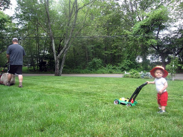 IMG_4300b.jpg - Nathan's first lesson on how to mow the yard.  Yes, we like to start them young in helping out around the house!