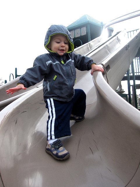 IMG_6890.jpg - Nathan attempting to scale down the slide instead of on his bum, hmmm.