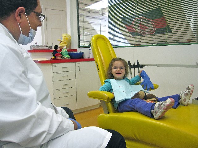 IMG_7389.jpg - Catherine's first visit with the dentist.  She was loving the "banana chair".