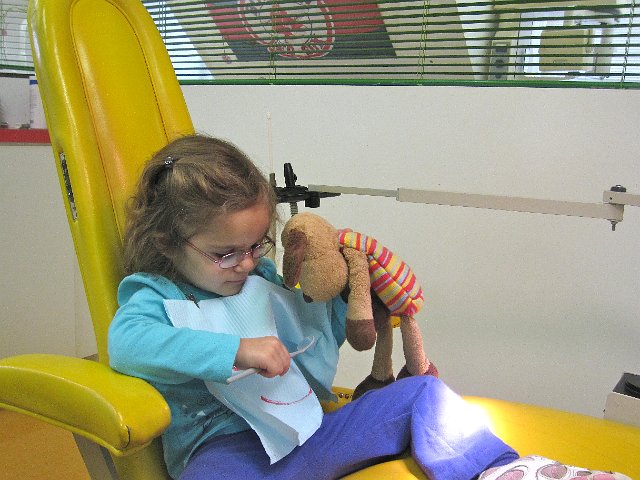 IMG_7398.jpg - Even Charlie gets a little checkup while Catherine is playing with the mirror instrument.