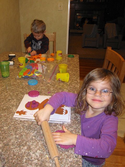 IMG_3264.jpg - PlayDoh time with a little holiday twist; their job was to decorate the gingerbread men.