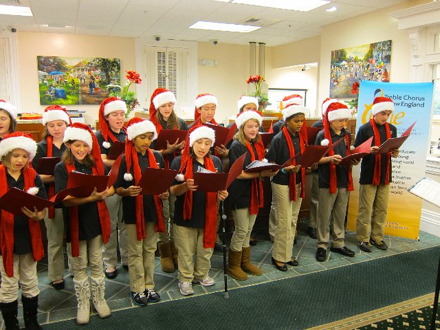 IMG_6060.jpg - They even enjoyed the carolers.  Catherine is a BIG fan of Christmas music and has done her best this season to learn the words to as many songs as possible .. so this was a treat.