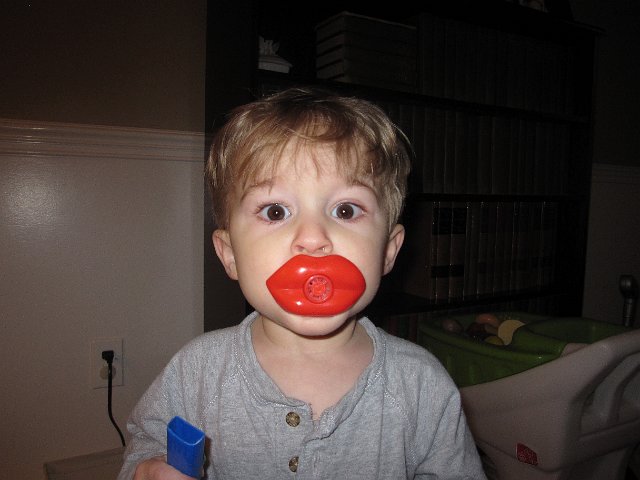 IMG_8118.jpg - Valentine's Day is right around the corner so Nathan's getting ready with his lips/noisemaker.