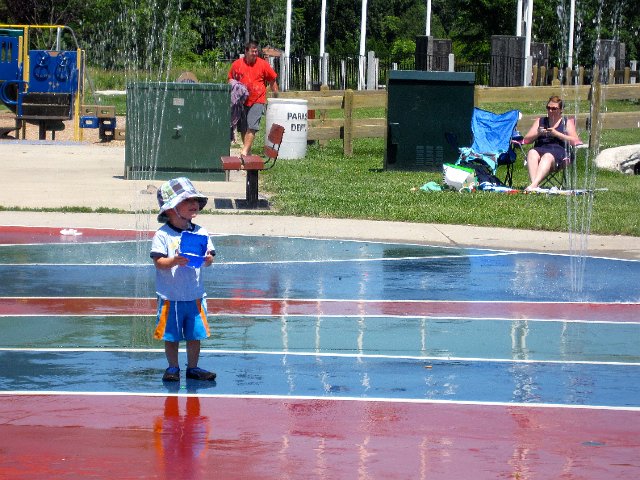 IMG_0700.jpg - This little park offers a sprinkler pad and a playground all in one = fabulous fun for everyone!