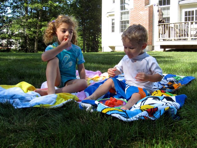 IMG_0932.jpg - Abigail is being so nice in "sharing" the watermelon while Nathan takes over the plate.