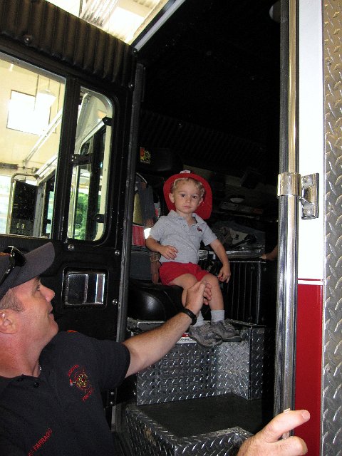 IMG_0994.jpg - He was oh so serious anytime he sat inside the fire truck.