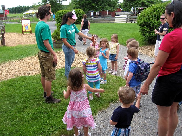 IMG_0210.jpg - We attended the birthday party of our pal, Abigail, at Davis Farmland.  The guest of honor gets to ring the cow bell to start off our barnyard tour.