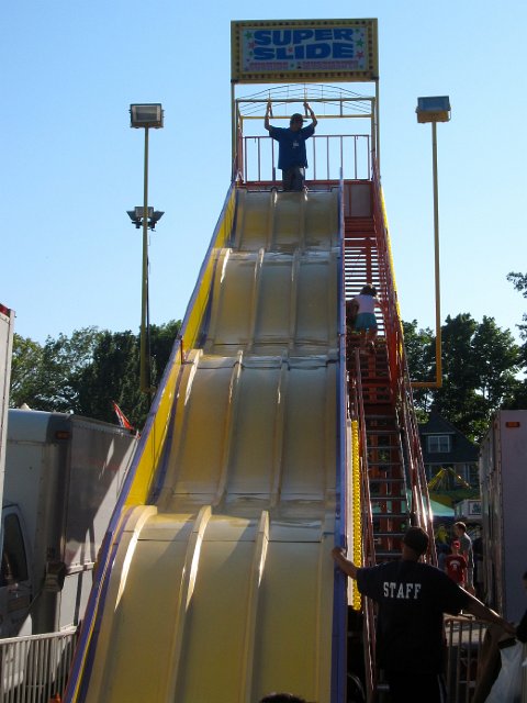 IMG_9809.jpg - Catherine chose the Super Slide.  There she is, marching up all those stairs all by herself.