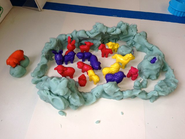 IMG_3257.jpg - This is Catie Ann's ultimate favorite place at school, the PlayDoh table.  She races here to claim the farm animals, specifically the purple ones.