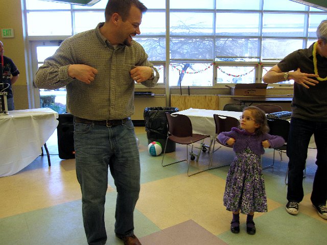 IMG_4853.jpg - No dance is complete without the "chicken dance".  Catie Ann follows along with her instructor, Daddy.