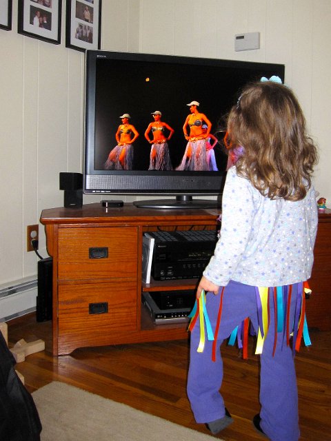 IMG_5285.jpg - So I tried to share a little bit of the Hawaiian culture with her by making a quick grass skirt of her own and the hula dance.