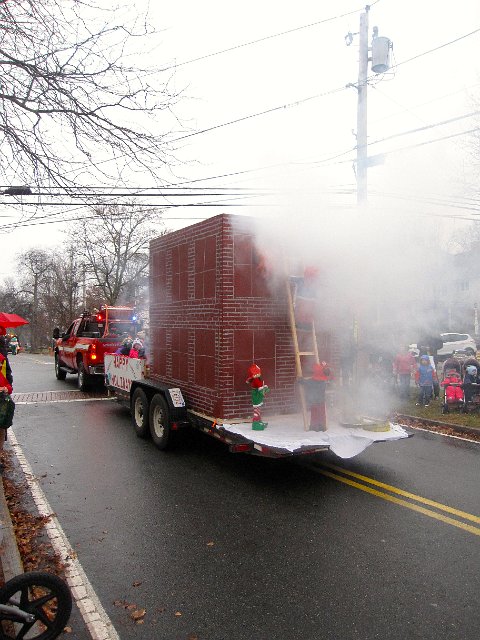 IMG_8932.jpg - The parade is sponsored by the Firefighters so this year they included a little fire education along the way too.
