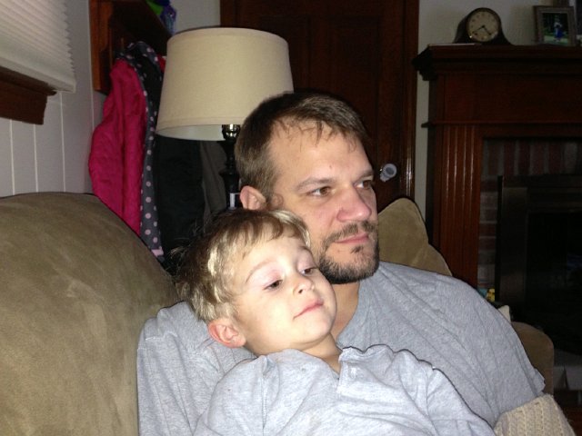 IMG_2954.jpg - Daddy and Nathan enjoying some movie time.