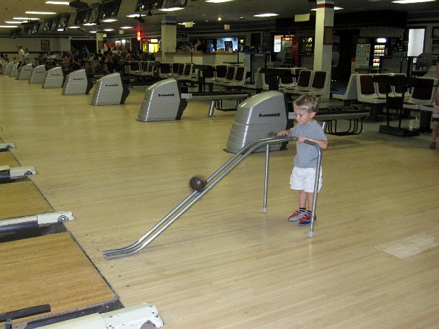IMG_7172.jpg - With a little help from bumpers and this cool kid tool, we rolled right into a candlepin bowling adventure.