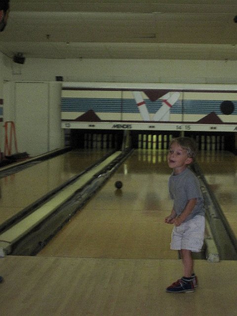 IMG_7190.jpg - Nathan enjoyed rolling the balls so fast, he never seemed to watch what or how many pins even fell.