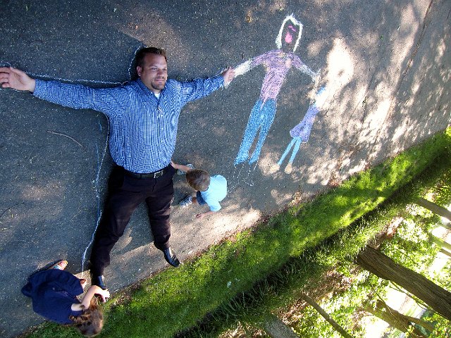 IMG_6371.jpg - Today's artwork session was a family portrait.  So as soon as Dad arrived home from work, he was needed for his part.