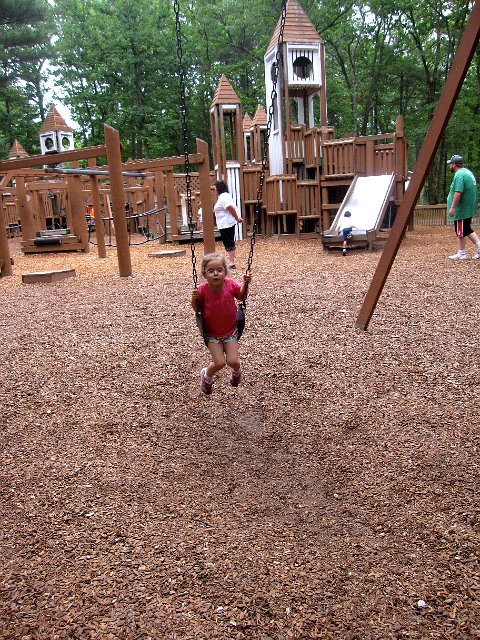 IMG_6942.jpg - Playground pitstop.  Catie Ann is learning to do the swing on her own these days.