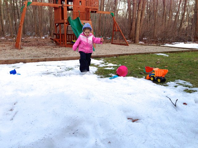 IMG_3096.jpg - A warm weather day to take advantage of the remaining snow and build snow castles.  Catie Ann is seen here stomping her castle remains.