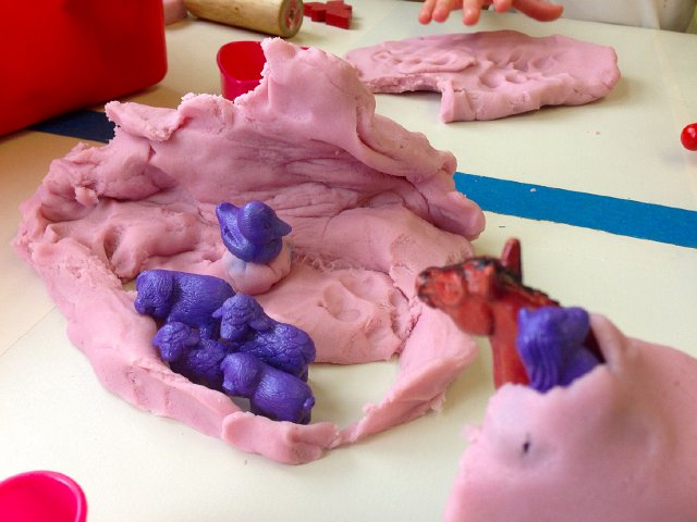 IMG_1422.jpg - Her favorite playdoh scene ... a farm AND the purple animals.  The teachers mentioned that she is always the first one inside so she can get her hands on those purple farm animals first!