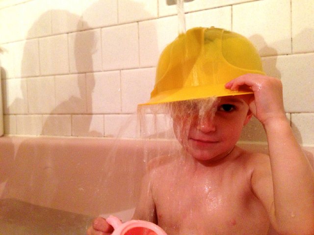 IMG_3443.jpg - Bath time with a tea pot and a construction worker???