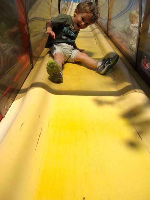 IMG_6102.jpg - Nathan ended the day with a ride down the fun house chute.